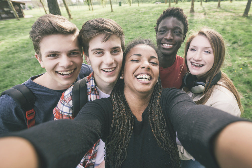 Teens taking a selfie